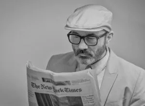 man reading a newspaper
